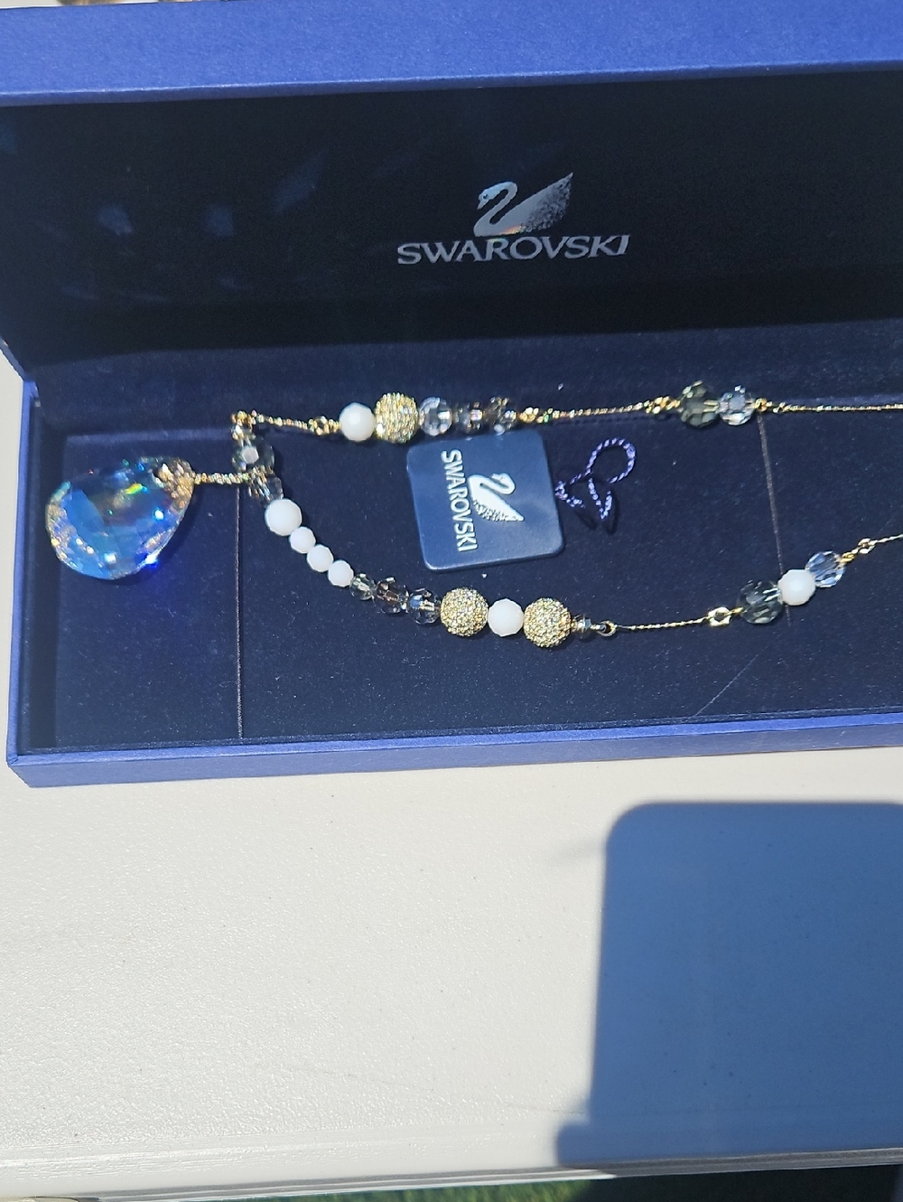 Swarovski Gold-Tone Necklace with Blue Crystal Teardrop and White Beads